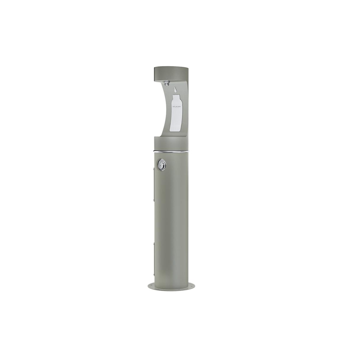 Gray pedestal water bottle filling station with curved upper section and circular valve opening on cylindrical base.