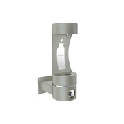 Gray stainless steel wall-mounted bottle filling station with single arm dispenser and drain basin.