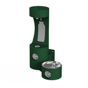 Green wall-mounted bottle filling station with single drinking fountain and stainless steel bowl at base.