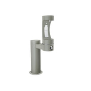 Gray outdoor pedestal water bottle filling station with single upper spout and control valve.