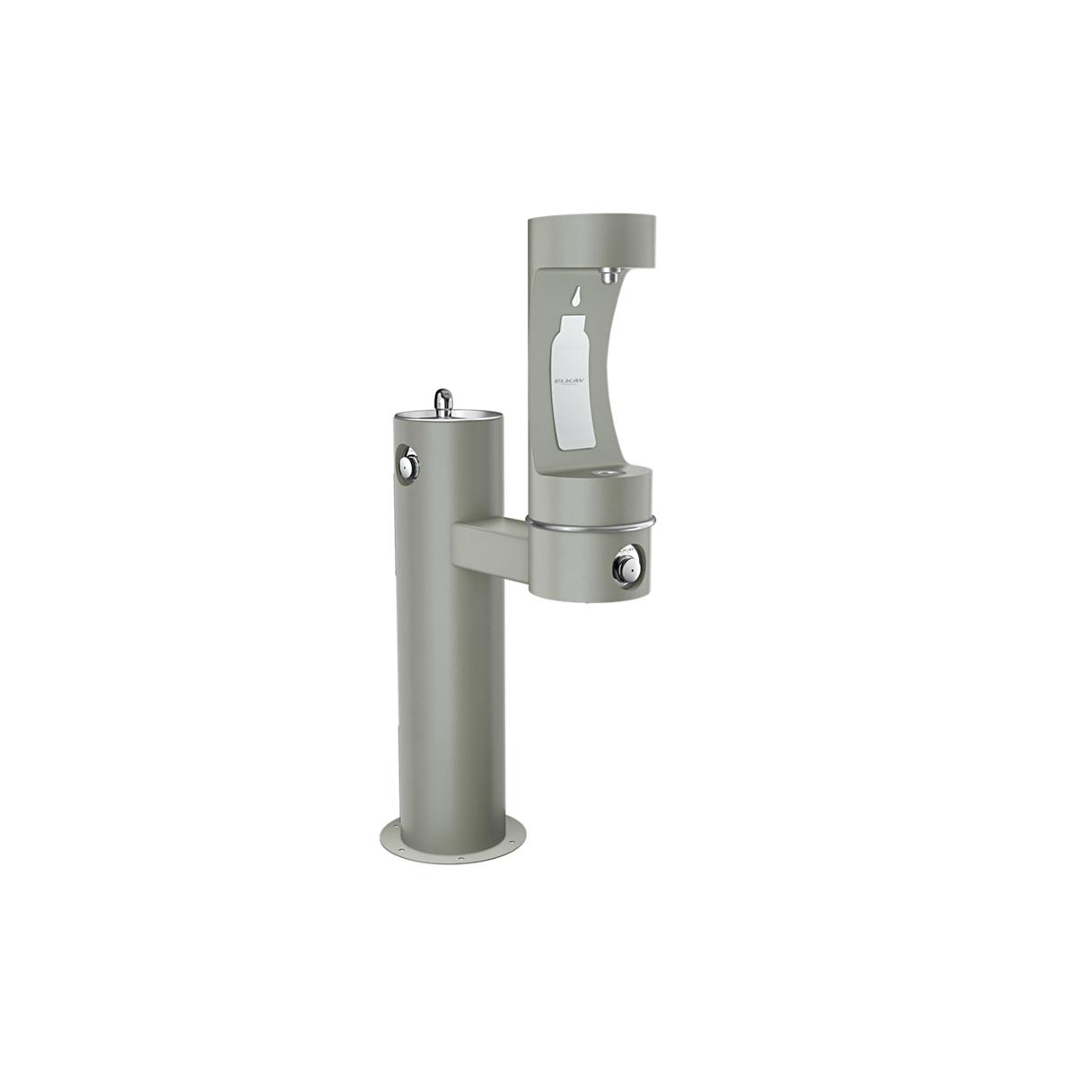 Gray pedestal-mounted outdoor water filling station with two spouts at different heights and foot pedal controls.