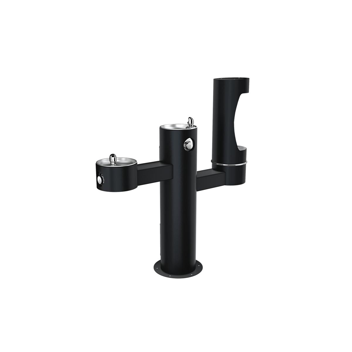 Black pedestal water fountain with three spouts at different heights for filling bottles, mounted on ground base.