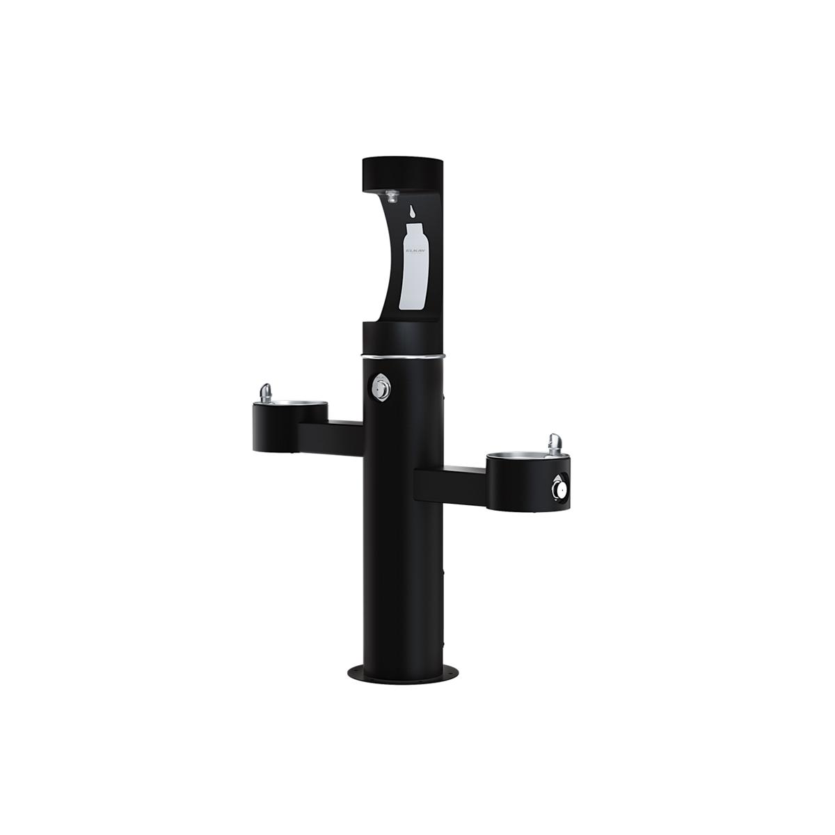 Black pedestal water station with upper bottle filling spout and two lower drinking fountains with foot pedal controls.