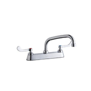 Chrome centerset faucet with arched spout and wristblade handles on exposed deck plate.