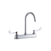 Chrome kitchen faucet with gooseneck spout and curved wristblade handles on deck base.
