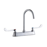 Chrome centerset faucet with gooseneck spout and white wristblade handles on rectangular deck plate.