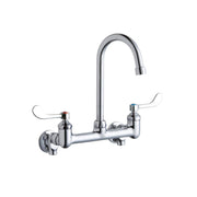 Chrome wall-mount faucet with gooseneck spout and wristblade handles on either side.