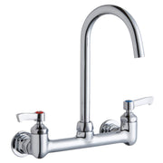 Chrome deck-mount faucet with curved gooseneck spout and two white lever handles with color-coded indicators.