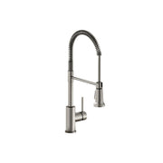 Lustrous steel kitchen faucet with curved semi-professional spout, lever handle, and coiled hose spray.