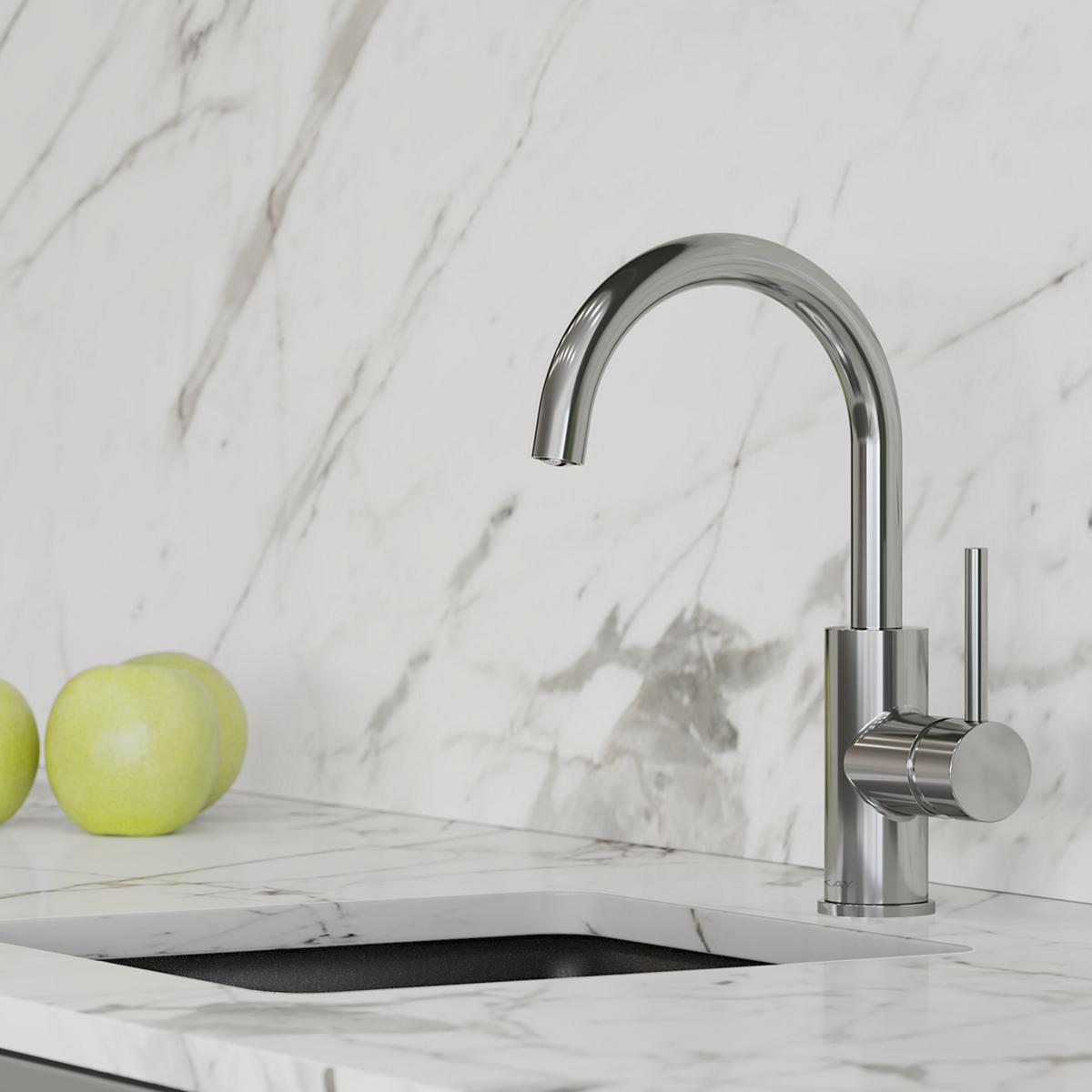 Chrome single-hole bar faucet with curved spout and cylindrical lever handle on marble countertop.