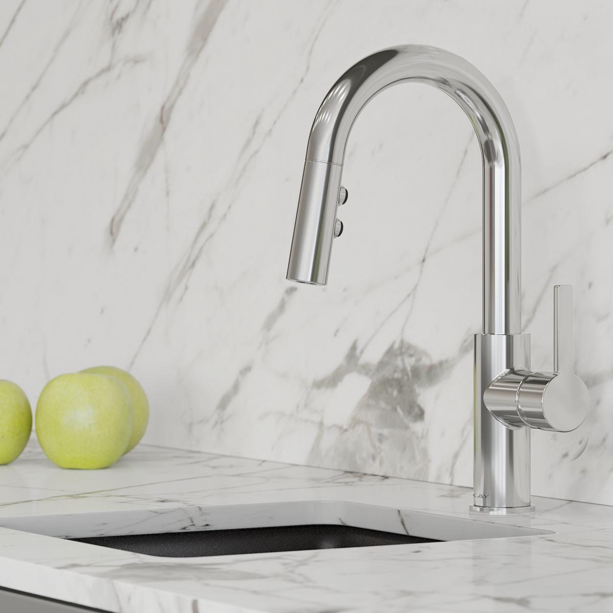 Chrome bar faucet with curved spout, pull-down spray, and lever handle on marble countertop.