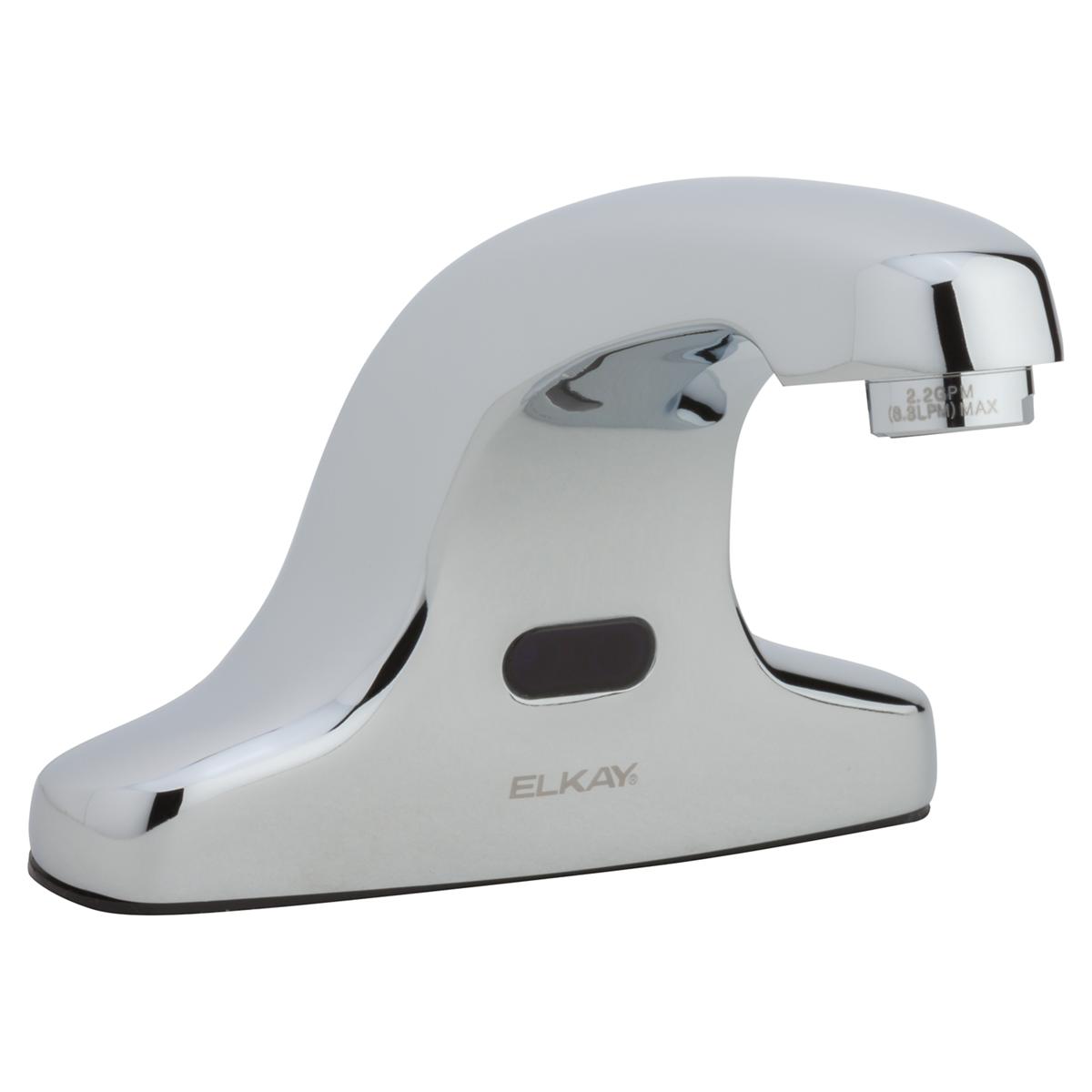 Chrome and white electronic deck mount faucet with curved spout and sensor controls.