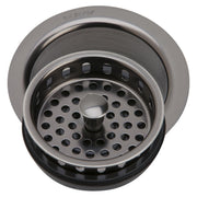 Antique steel sink drain fitting with removable strainer basket and perforated drainage holes.