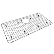 Stainless steel sink grid with parallel bars, circular center opening, and black rubber feet for support.