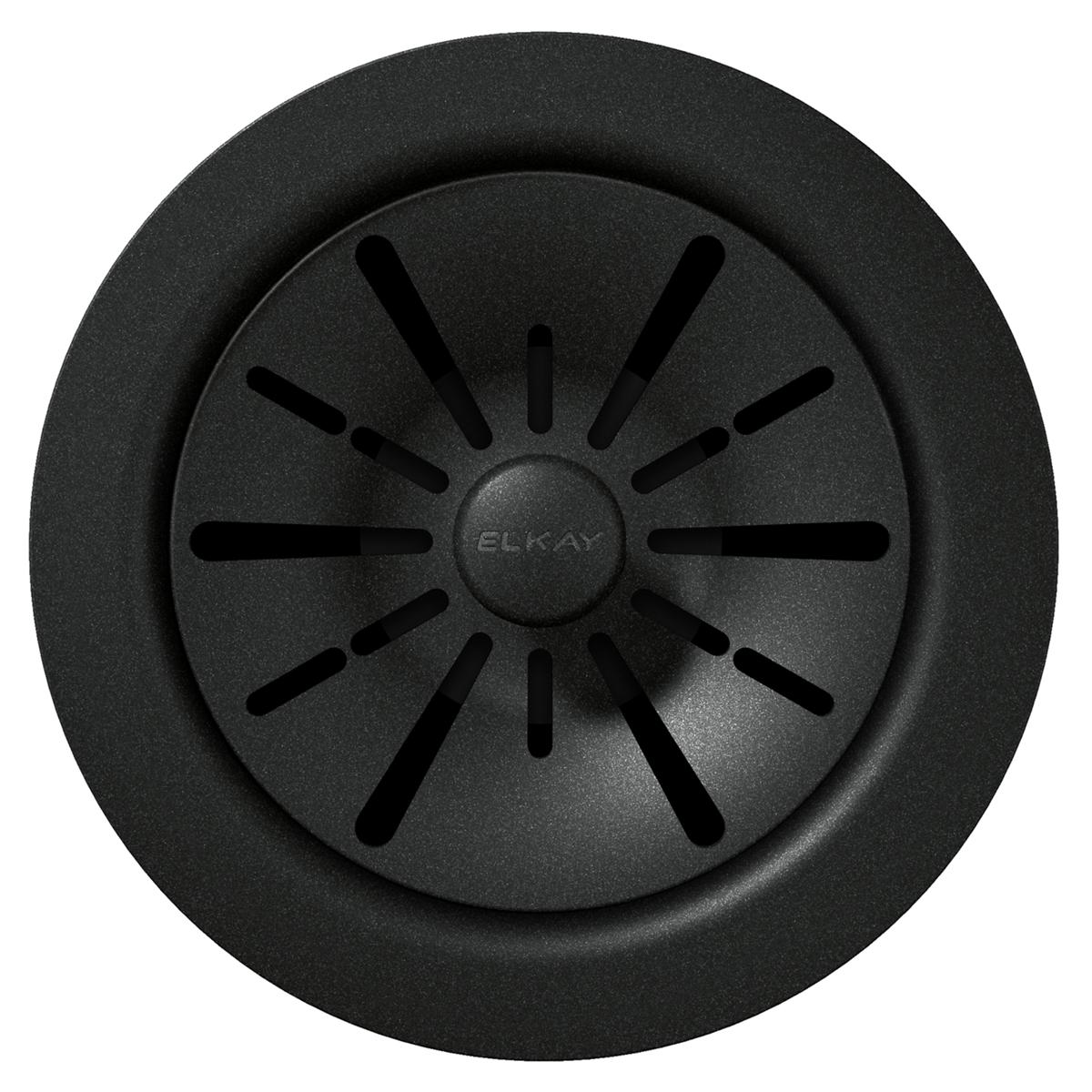 Black polymer sink drain flange with radiating slot pattern and removable basket strainer insert.