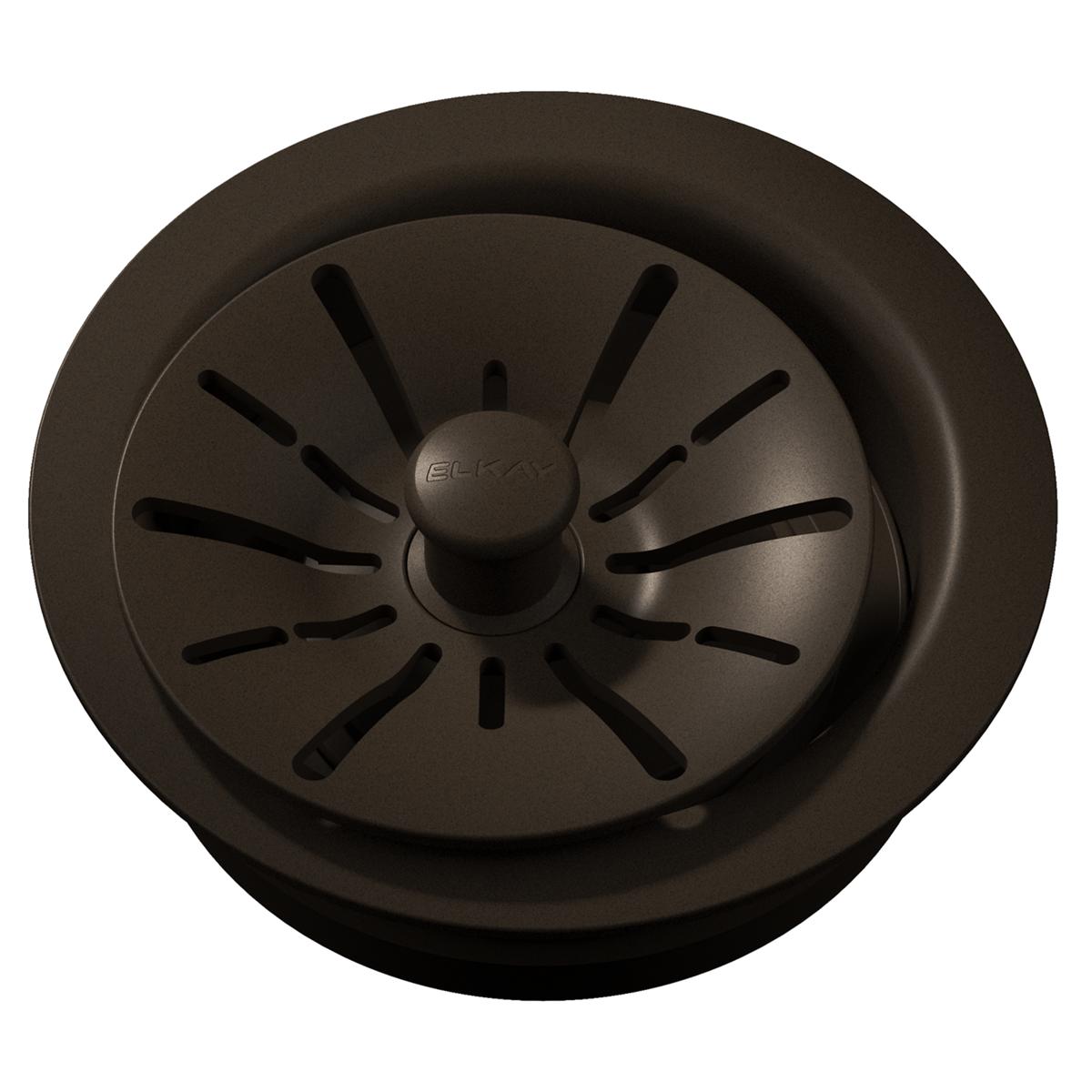 Mocha polymer sink drain flange with removable basket strainer and radial slot pattern for disposal.