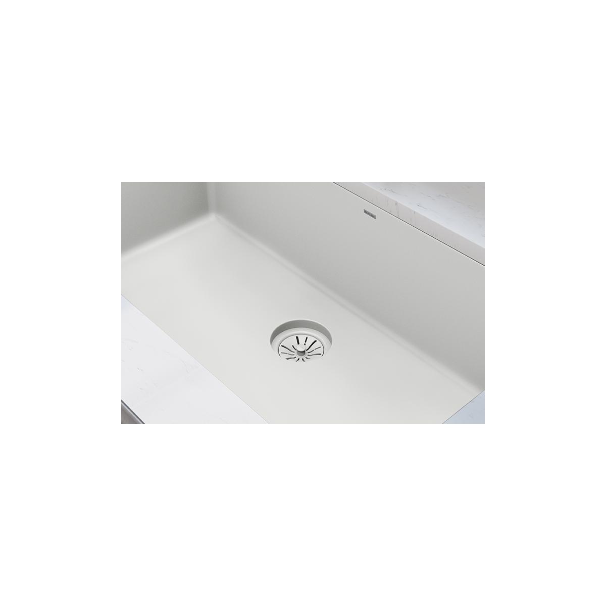 Parchment polymer disposer flange with basket strainer installed in white quartz sink basin.