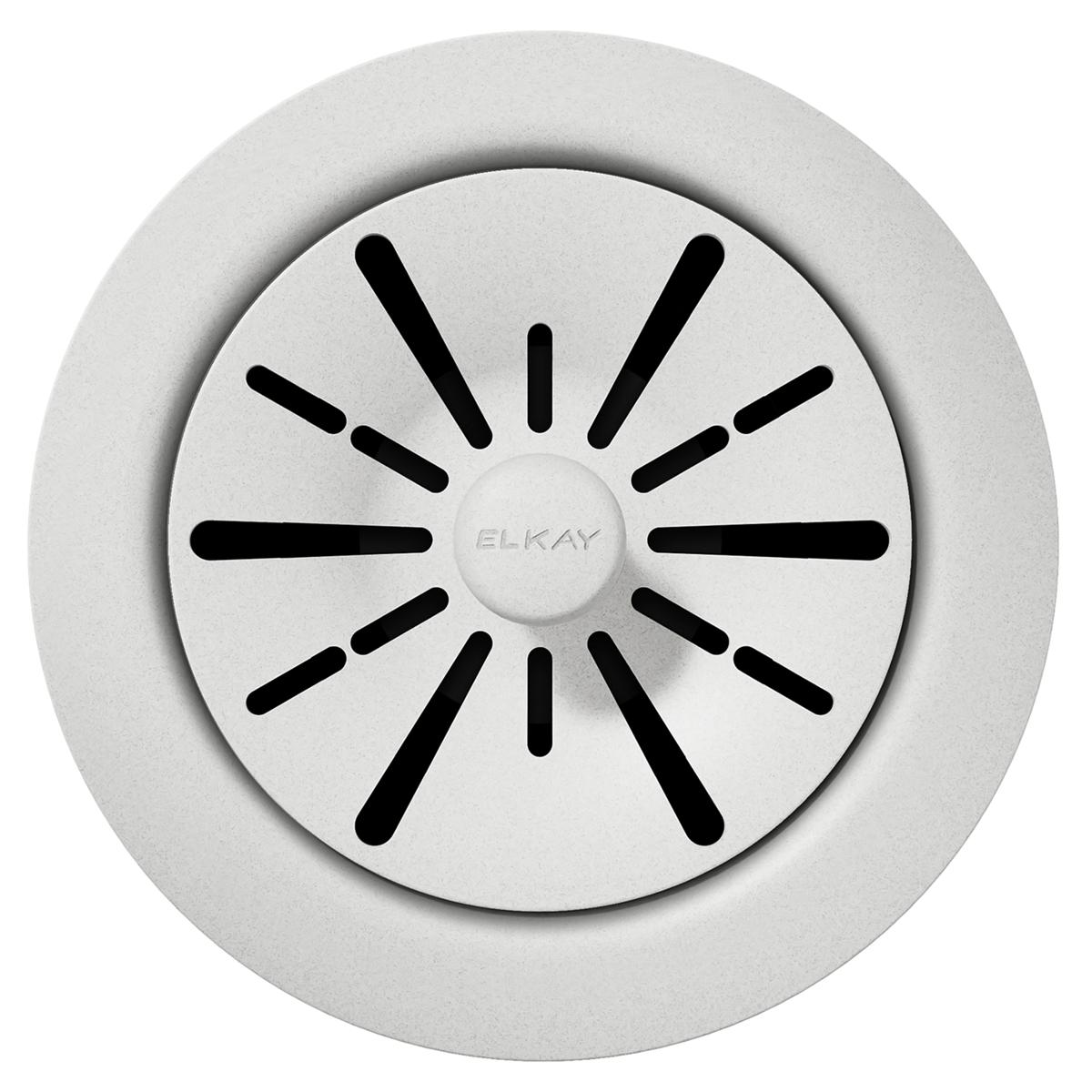 White polymer sink drain flange with removable basket strainer and black radial slot pattern.