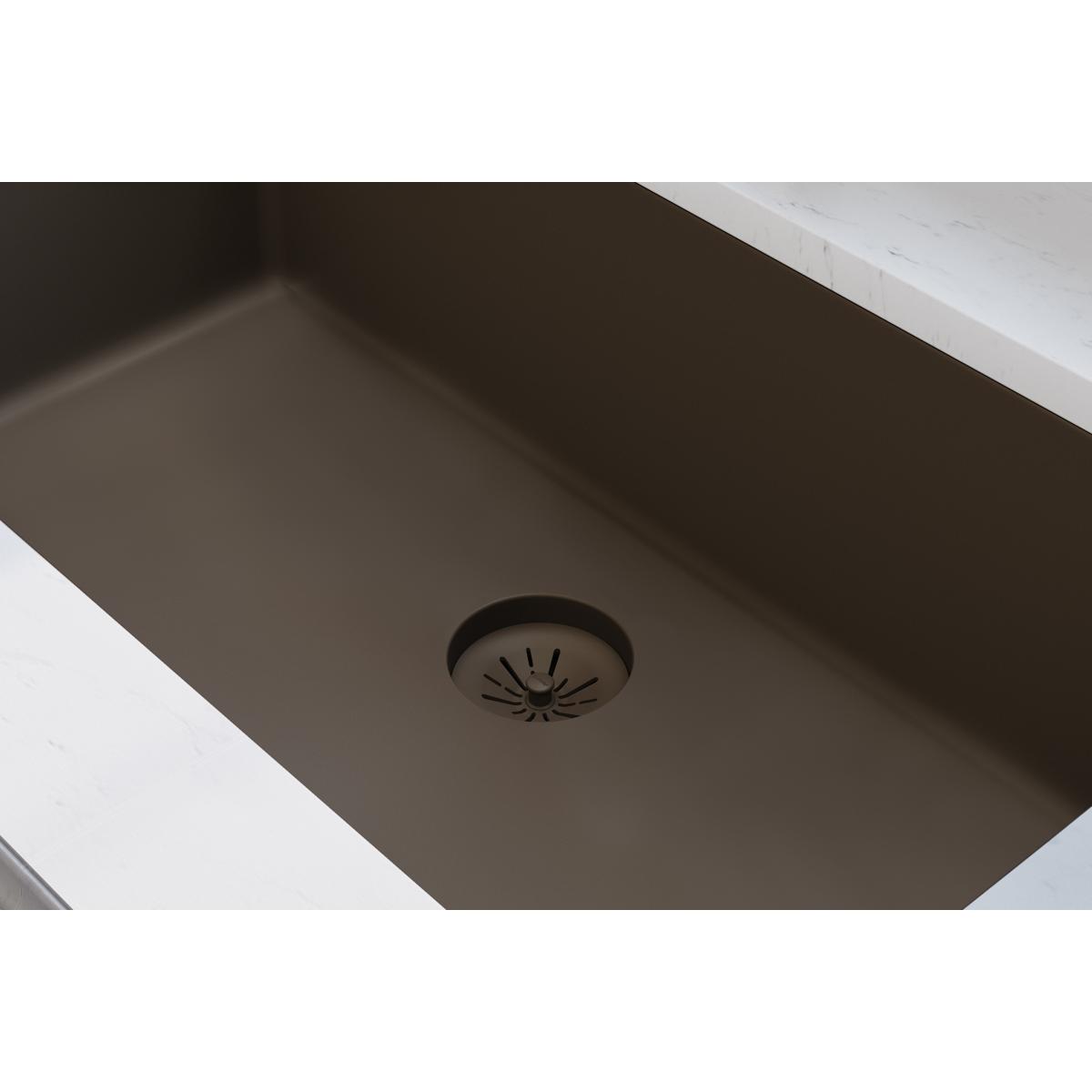 Chestnut-colored basket strainer with radiating slot pattern installed in sink drain opening.