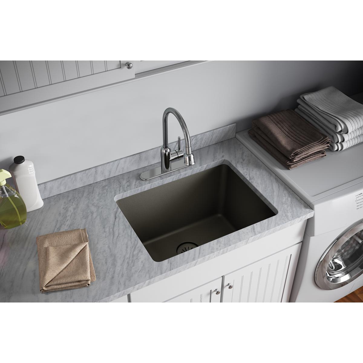 Dusk gray polymer basket strainer and rubber stopper for 3-1/2" sink drain opening.