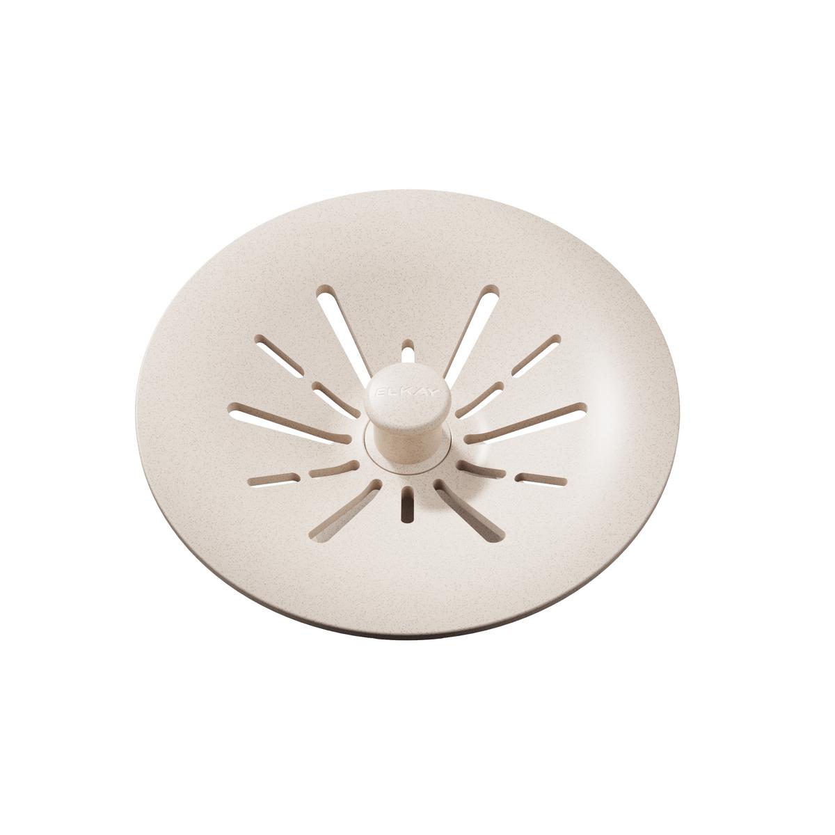 Beige polymer basket strainer with radial slots and center post for sink drain.