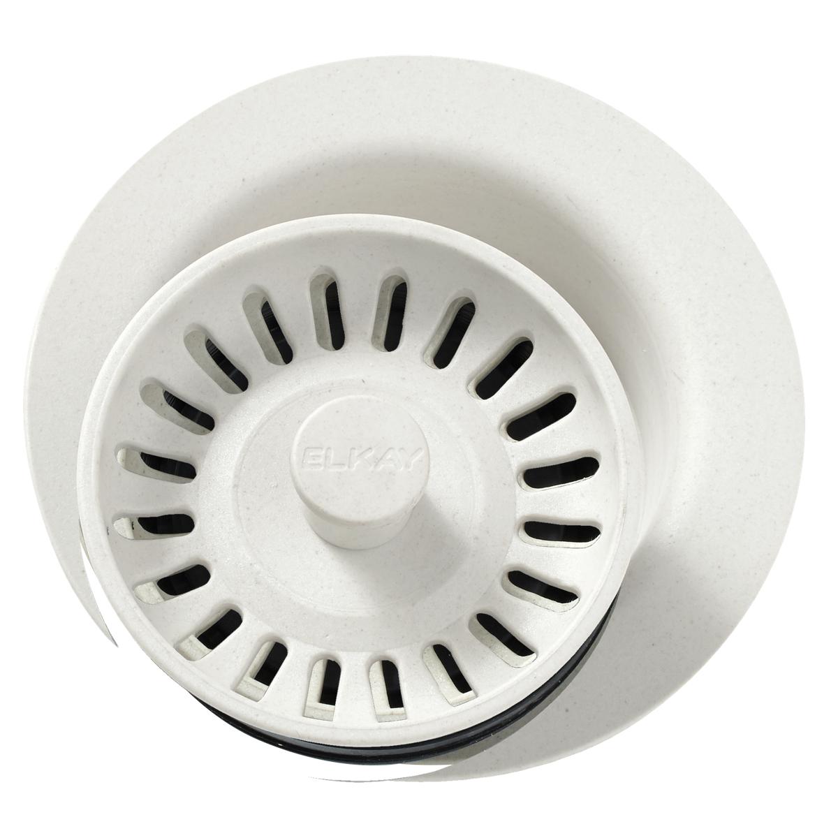 Parchment polymer disposer flange with removable basket strainer and rubber stopper ring, viewed from above.