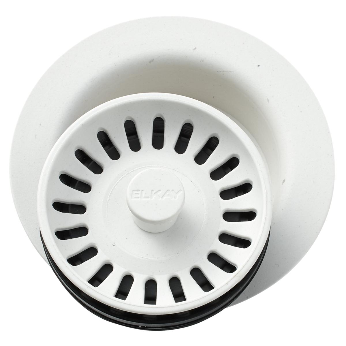 White polymer disposer flange with removable basket strainer featuring black drainage slots and central knob, shown from abov