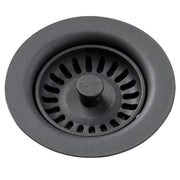 Charcoal polymer drain fitting with removable basket strainer and central rubber stopper, viewed from above.