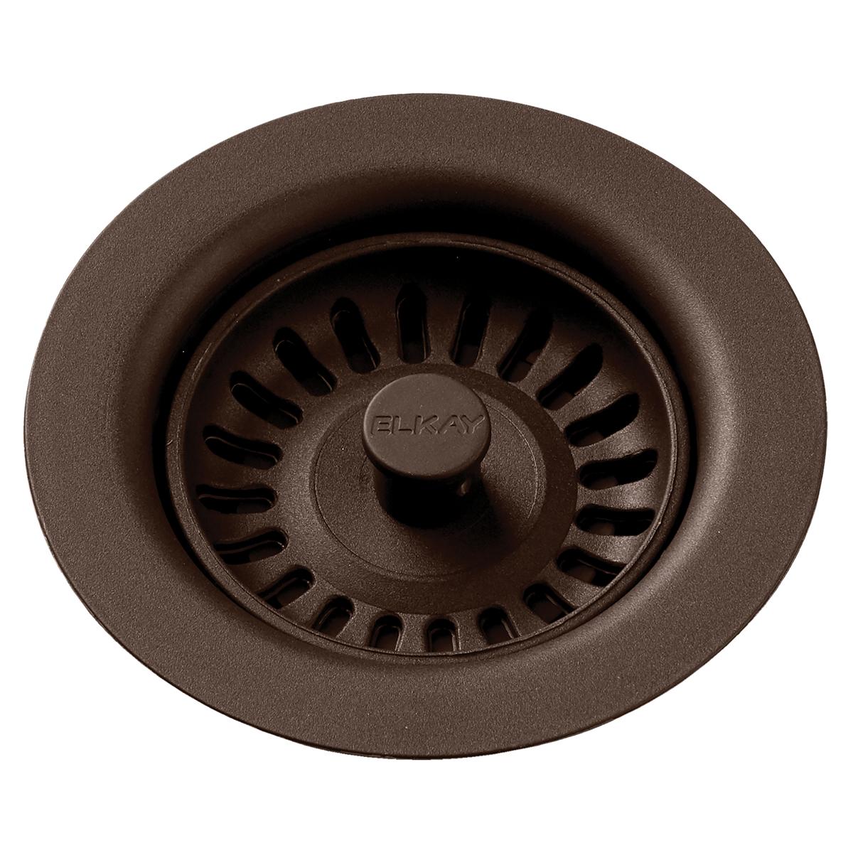 Mocha polymer drain fitting with removable basket strainer and center post, viewed from above.