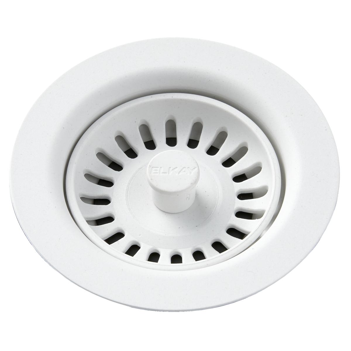 White polymer drain fitting with removable basket strainer and central post, viewed from above.