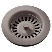 Silvermist polymer drain fitting with basket strainer and removable center knob for sink installation.
