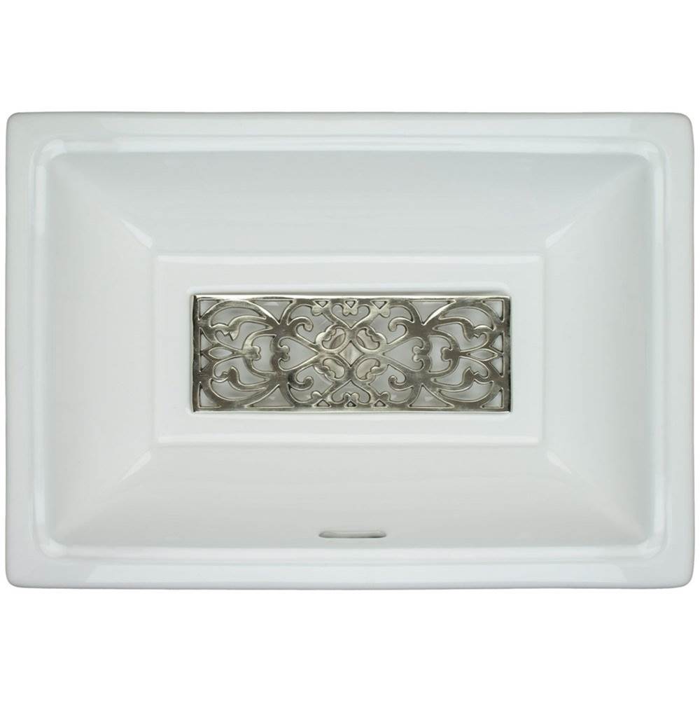 Rectangular white ceramic sink basin with ornate filigree brass grate insert in center.