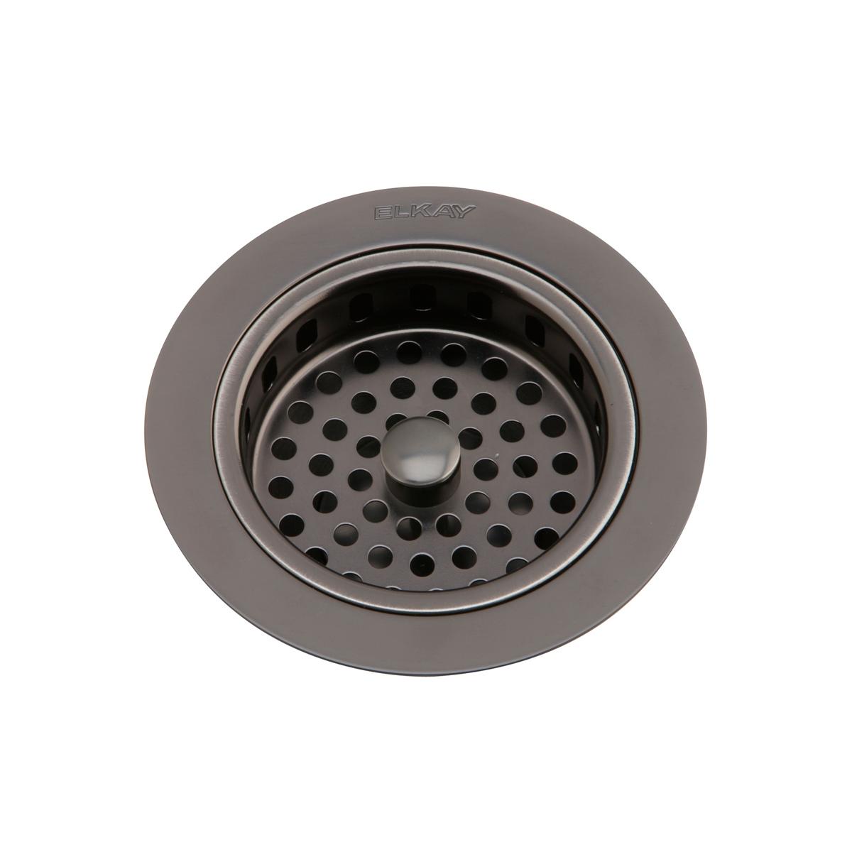 Antique steel drain fitting with perforated basket and center post, viewed from above.