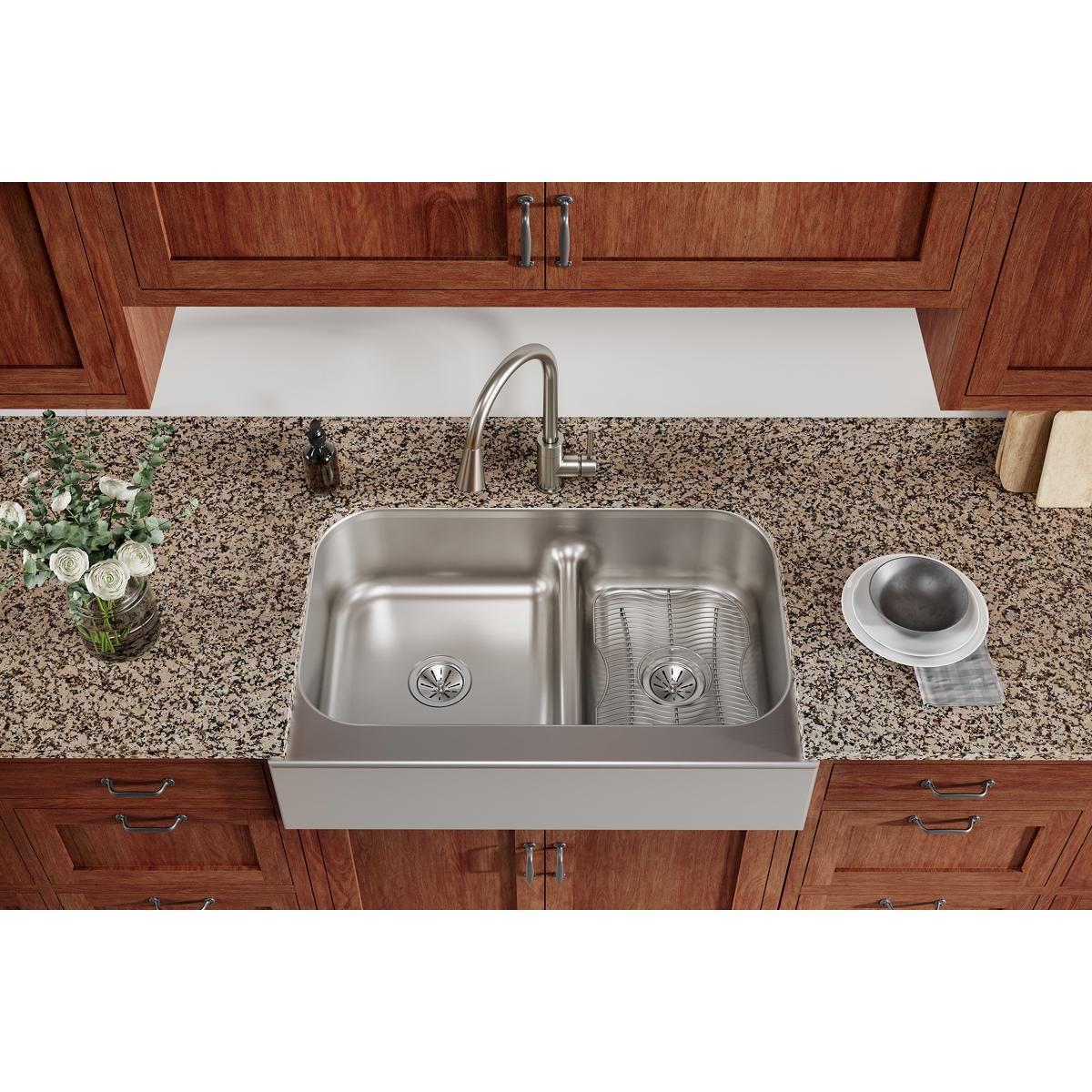 Stainless steel bottom grid with welded cross pattern, designed to fit Elkay kitchen sink basin.