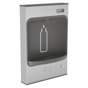 Elkay ezH2O stainless steel surface mount bottle filling station with dark interior basin and digital display panel.
