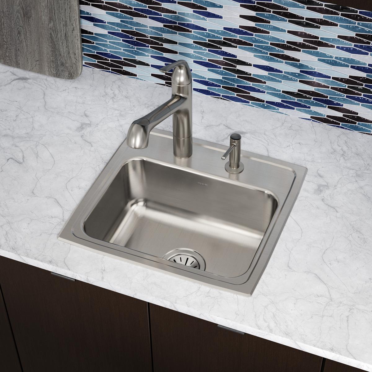 Stainless steel drop-in sink with single bowl, one faucet hole, and matching faucet installed on marble countertop.