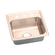 Copper-colored drop-in sink with single bowl, three pre-drilled holes, and drain opening on brushed metal rim.