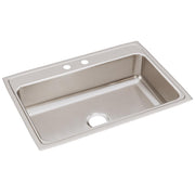 Stainless steel drop-in sink with single bowl and two faucet holes on the rim.