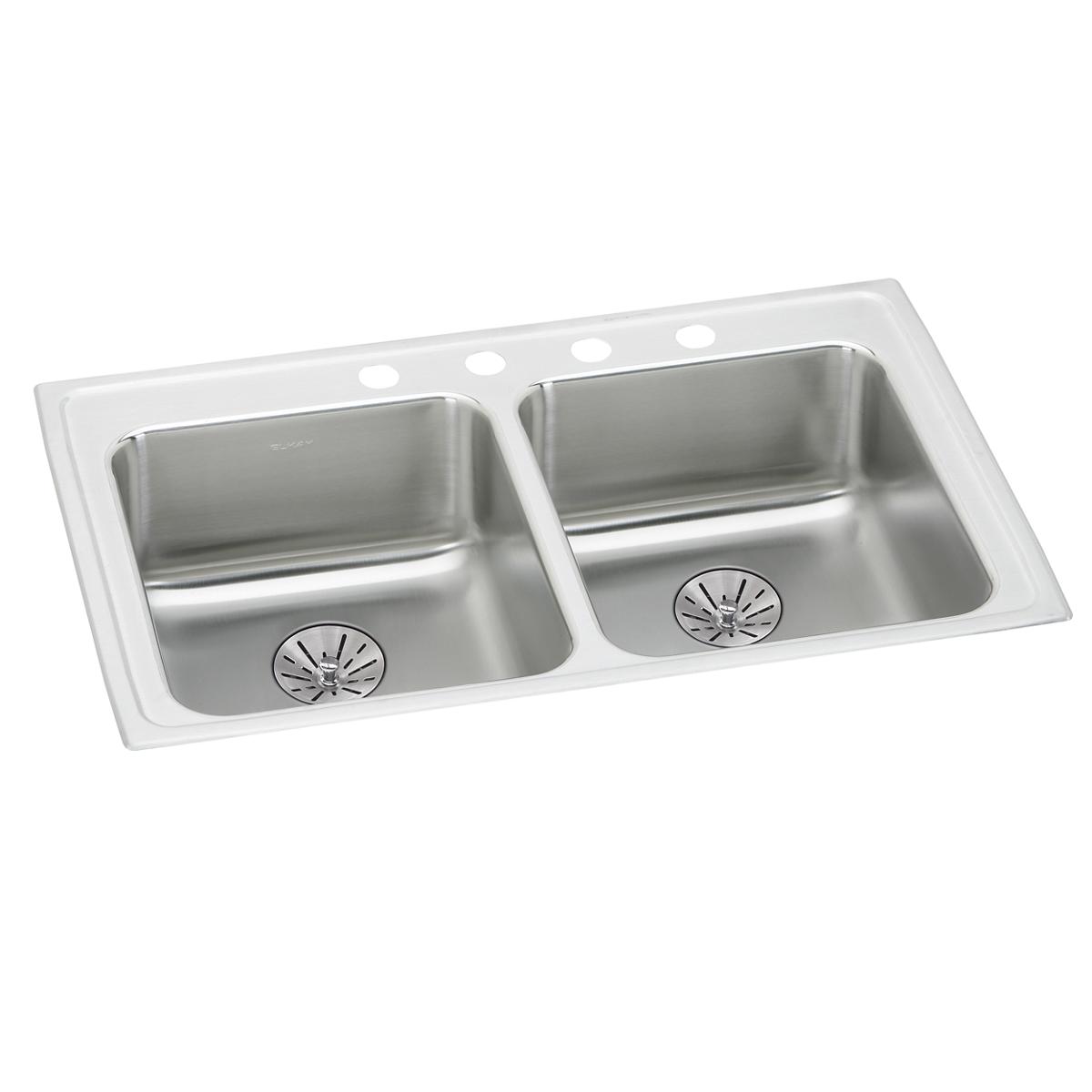 Stainless steel double bowl drop-in sink with two faucet holes and drain strainers visible in each basin.