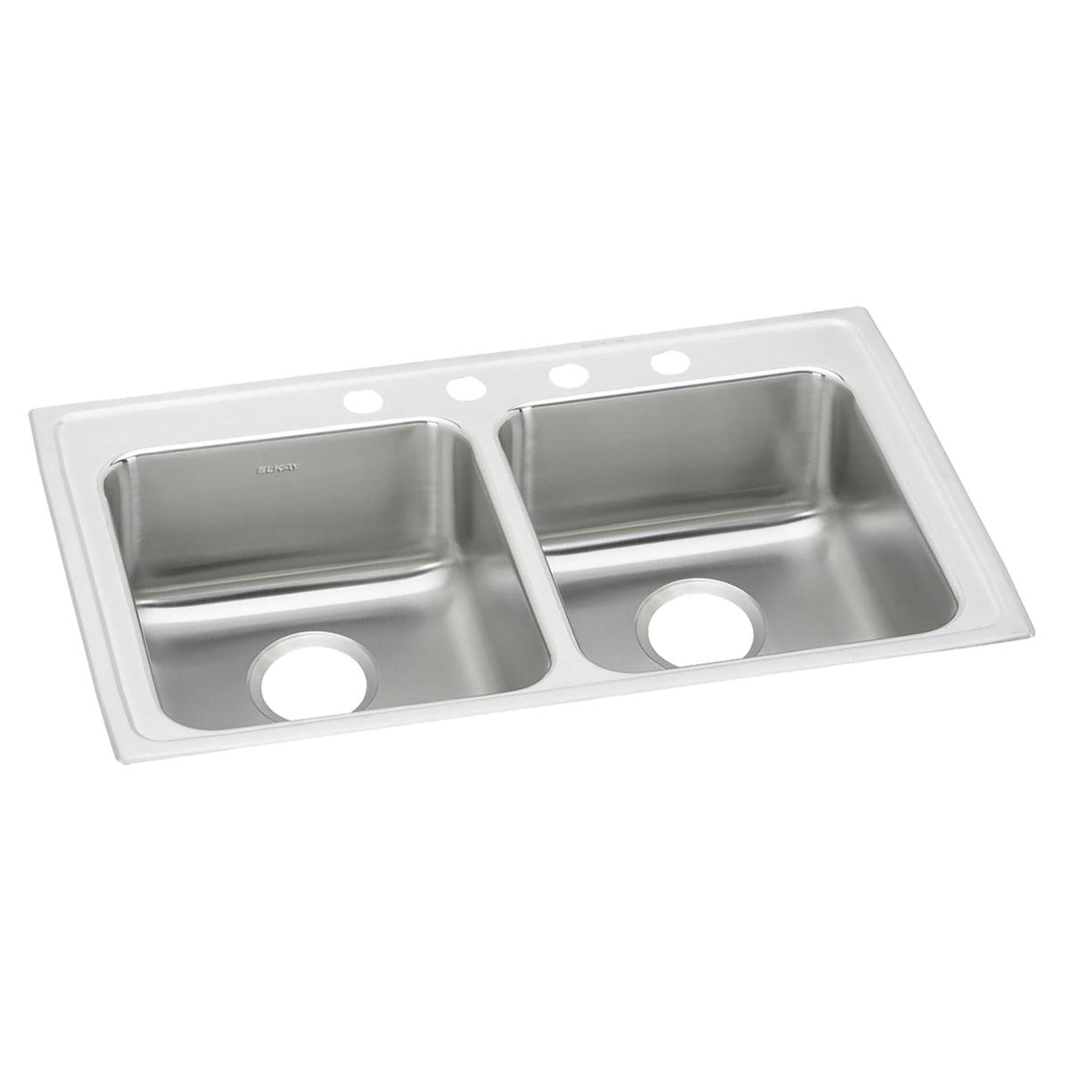 Stainless steel double bowl drop-in sink with white rim and four faucet holes along the top edge.