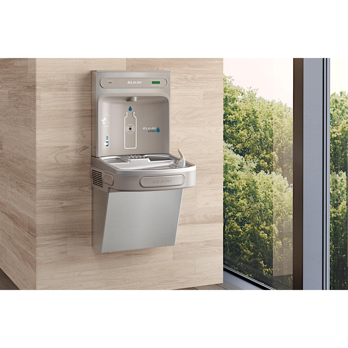 Stainless steel Elkay wall-mounted bottle filling station with integrated drinking fountain and filtered water dispenser.