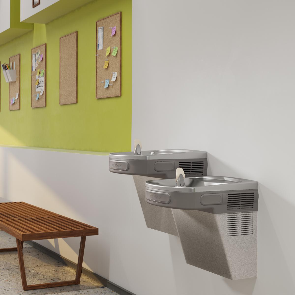 Wall-mounted bi-level water cooler with light gray granite finish and dual drinking fountains at different heights.