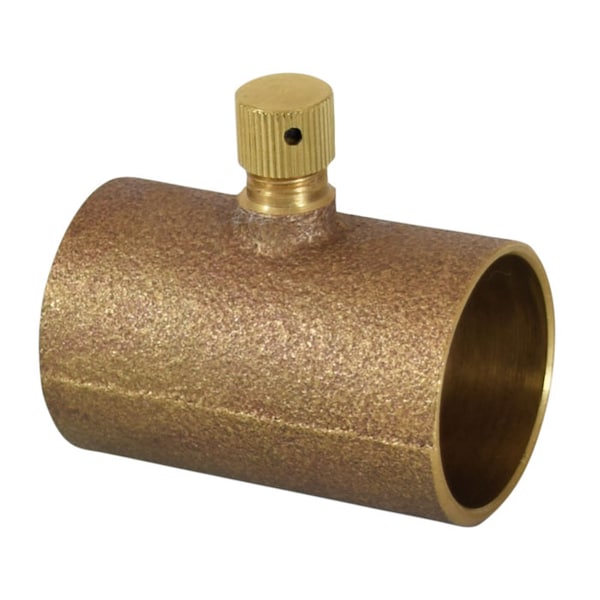 Cast brass drain coupling with grooved cap and small vent hole on top.