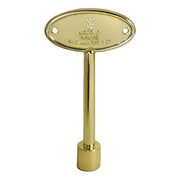 Brass valve key with oval head marked "Legend Valve" and cylindrical shaft with mounting holes.