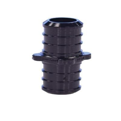 Black plastic PEX coupling with ribbed cylindrical body and blue collar ring on white background.