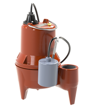 Red cast iron submersible sewage pump with black motor head, gray float switch, and electrical connections mounted on top.