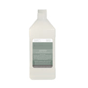 Clear plastic bottle containing evergreen essential oil with gray label and white cap.