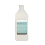 Clear plastic bottle with white cap and teal label containing Breathe essential oil aromatherapy liquid.