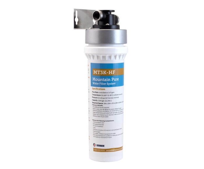 White cylindrical water filter system with silver cap and black inlet/outlet ports labeled MT3K-HF.