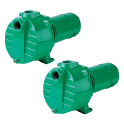 Two green Myers QP20 sprinkler pumps with cylindrical motors and rectangular pump bodies.
